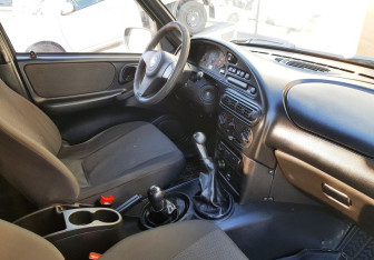 Подержанный автомобиль Chevrolet Niva 2011 года (9 фото)
