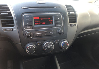 Подержанный автомобиль Kia Cerato Sedan 2014 года (11 фото)