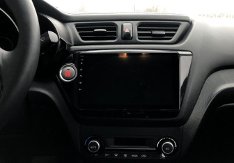 Подержанный автомобиль Kia Rio Sedan 2015 года (14 фото)