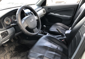 Подержанный автомобиль Nissan Almera Classic 2006 года (9 фото)