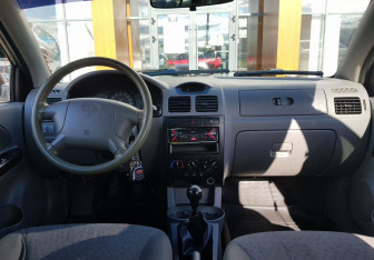 Подержанный автомобиль Kia Rio Wagon 2005 года (11 фото)