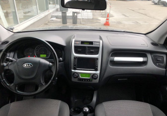 Подержанный автомобиль Kia Sportage 2010 года (11 фото)
