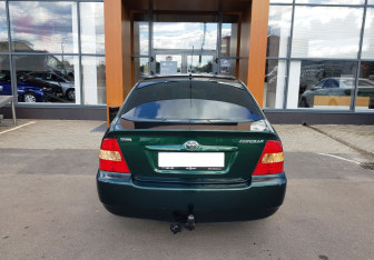 Подержанный автомобиль Toyota Corolla Sedan 2003 года (6 фото)