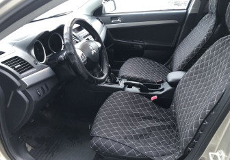 Подержанный автомобиль Mitsubishi Lancer Sedan 2011 года (9 фото)