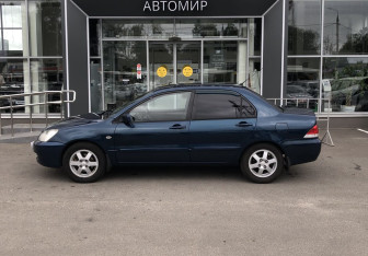 Подержанный автомобиль Mitsubishi Lancer Sedan 2005 года (8 фото)