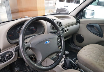 Подержанный автомобиль LADA (ВАЗ) Kalina Sedan 2010 года (10 фото)