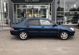 Подержанный автомобиль Mitsubishi Lancer Sedan 2005 года (4 фото)