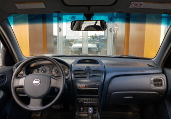 Подержанный автомобиль Nissan Almera Classic 2007 года (11 фото)