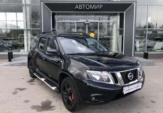 Подержанный автомобиль Nissan Terrano 2014 года (3 фото)