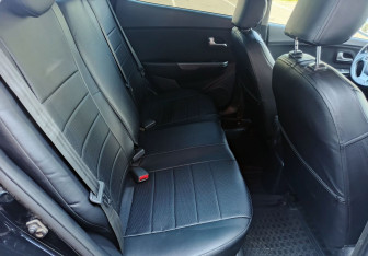 Подержанный автомобиль Kia Rio Sedan 2015 года (15 фото)