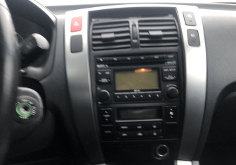 Подержанный автомобиль Hyundai Tucson 2008 года (14 фото)