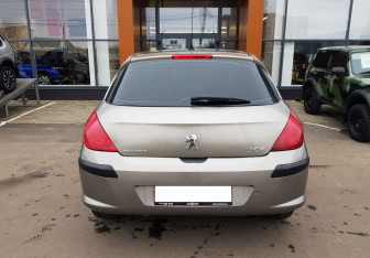 Подержанный автомобиль Peugeot 308 Hatchback 2010 года (6 фото)