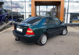 Подержанный автомобиль Toyota Corolla Sedan 2003 года (5 фото)