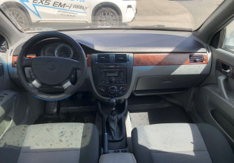 Подержанный автомобиль Daewoo Gentra Sedan 2013 года (10 фото)