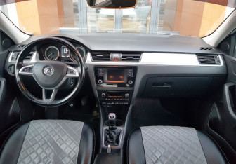 Подержанный автомобиль Skoda Rapid Liftback 2017 года (11 фото)