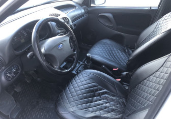 Подержанный автомобиль LADA (ВАЗ) Kalina Hatchback 2013 года (9 фото)