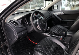 Подержанный автомобиль Kia Cerato Sedan 2011 года (9 фото)