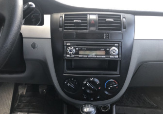 Подержанный автомобиль Chevrolet Lacetti Sedan 2012 года (13 фото)