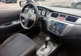 Подержанный автомобиль Mitsubishi Lancer Sedan 2007 года (14 фото)