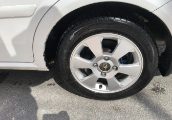Подержанный автомобиль Daewoo Gentra Sedan 2013 года (15 фото)