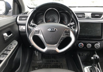 Подержанный автомобиль Kia Rio Sedan 2015 года (12 фото)