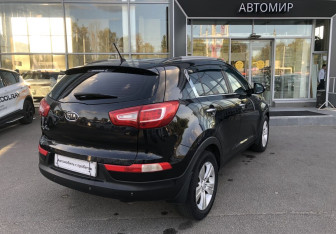 Подержанный автомобиль Kia Sportage 2011 года (7 фото)