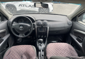 Подержанный автомобиль Nissan Almera Sedan 2013 года (10 фото)