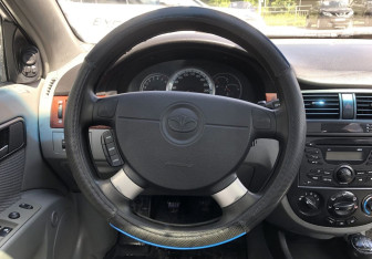 Подержанный автомобиль Daewoo Gentra Sedan 2013 года (12 фото)