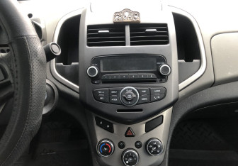 Подержанный автомобиль Chevrolet Aveo Sedan 2013 года (14 фото)