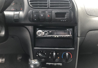 Подержанный автомобиль Kia Spectra Sedan 2007 года (14 фото)