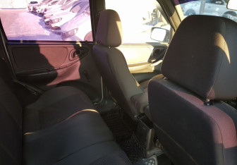 Подержанный автомобиль Chevrolet Niva 2014 года (10 фото)