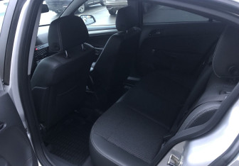 Подержанный автомобиль Opel Astra Sedan 2010 года (9 фото)