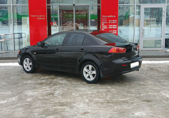 Подержанный автомобиль Mitsubishi Lancer Sedan 2008 года (7 фото)