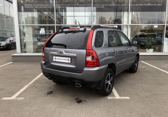 Подержанный автомобиль Kia Sportage 2010 года (7 фото)