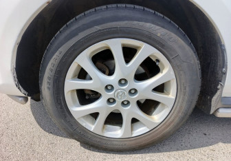 Подержанный автомобиль Mazda CX-7 2011 года (10 фото)