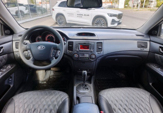 Подержанный автомобиль Kia Magentis 2010 года (14 фото)