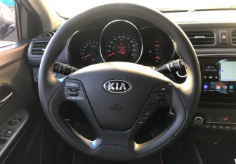 Подержанный автомобиль Kia Rio Sedan 2015 года (12 фото)