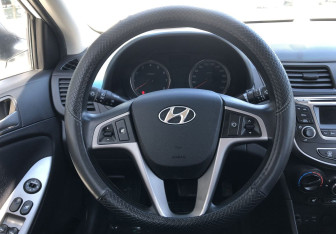 Подержанный автомобиль Hyundai Solaris Sedan 2014 года (12 фото)