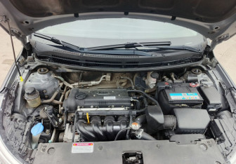 Подержанный автомобиль Kia Rio Sedan 2017 года (11 фото)