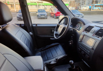 Подержанный автомобиль УАЗ Patriot 2014 года (14 фото)