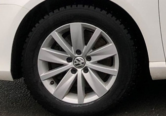 Подержанный автомобиль Volkswagen Passat Sedan 2012 года (15 фото)