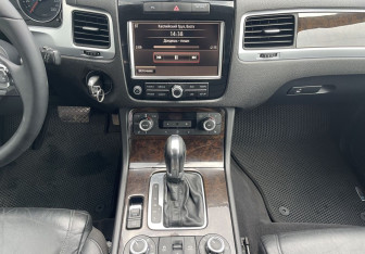 Подержанный автомобиль Volkswagen Touareg 2012 года (14 фото)