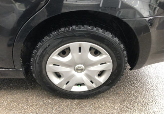 Подержанный автомобиль Nissan Tiida Sedan 2011 года (15 фото)