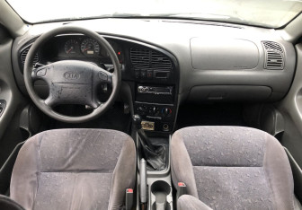 Подержанный автомобиль Kia Spectra Sedan 2007 года (10 фото)