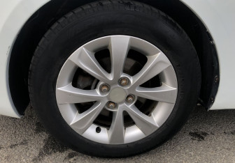 Подержанный автомобиль Kia Rio Sedan 2012 года (15 фото)