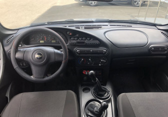 Подержанный автомобиль Chevrolet Niva 2013 года (10 фото)