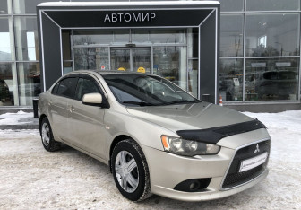 Подержанный автомобиль Mitsubishi Lancer Sedan 2011 года (3 фото)