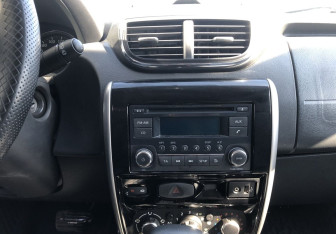 Подержанный автомобиль Nissan Terrano 2015 года (14 фото)