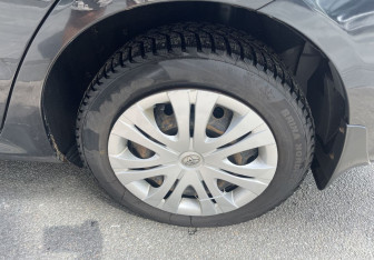 Подержанный автомобиль Toyota Corolla Sedan 2011 года (14 фото)