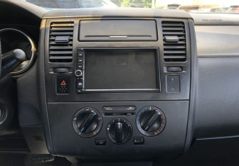 Подержанный автомобиль Nissan Tiida Sedan 2007 года (14 фото)
